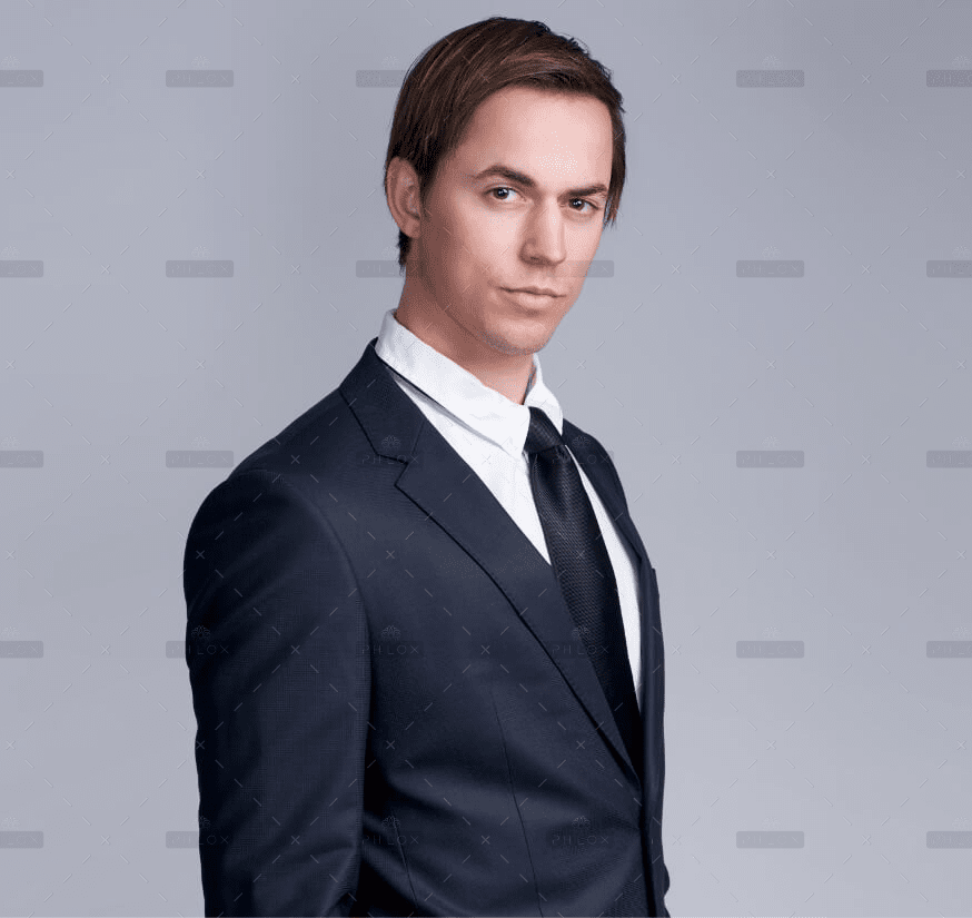demo-attachment-837-handsome-young-businessman-standing-against-gray-PFGZN4E